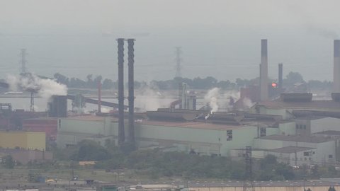 Hamilton, Ontario, Canada October 2018 Smog smoke carbon and pollution emissions from industry smokestacks