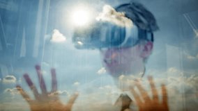 Reflection of a caucasian businessman wearing virtual reality goggles backlit by the sun themes of technology game virtual vr 360