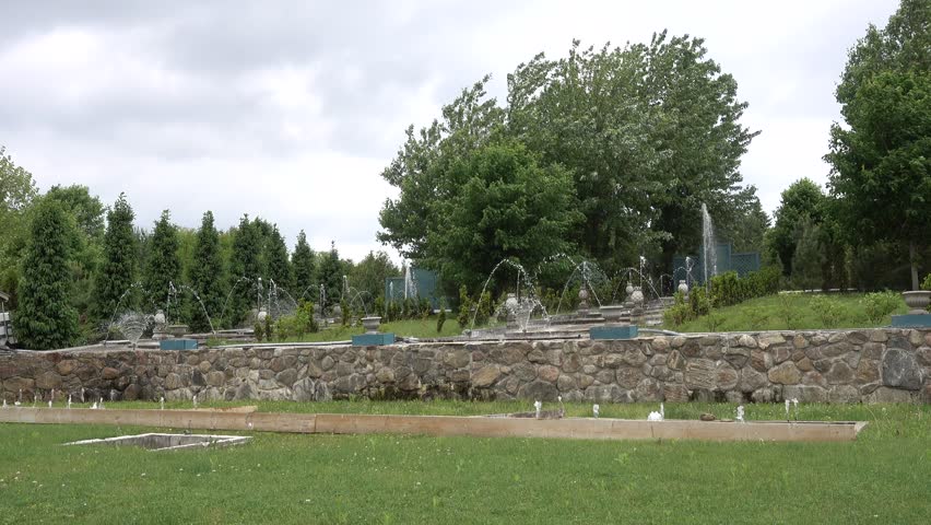 4K Wide View Water Fountains In Rock Garden