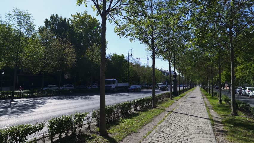 Andrassy Avenue, Budapest, Hungary downtown in summer stock video.
Gimbal, steadicam smooth 4K shot.