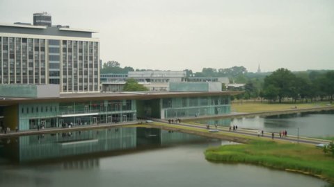 Overview of The High Tech Campus in Eindhoven with the lake. Cloudy day. Brainport. Noord-Brabant. Timelapse / Tilt-Shift