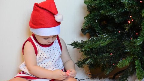 Infant young baby girl celebrate christmas
