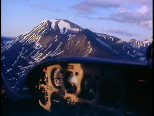 BROOKS RANGE, ALASKA, 1989, Aerial trip, POV midnight in June, plane panel