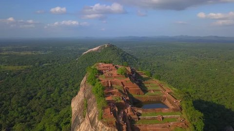 Aerial view of Sigiriya rock with tourists on the top Sri Lanka drone footage