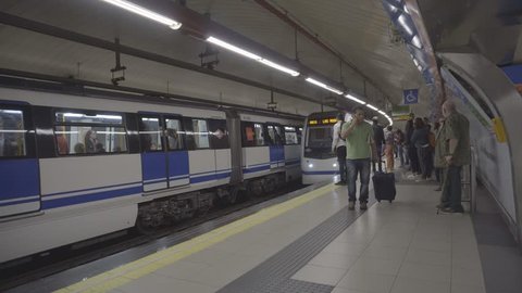 MADRID, SPAIN 12 MAY, 2018; Passenger in metro station waiting a subway in Madrid, Spain