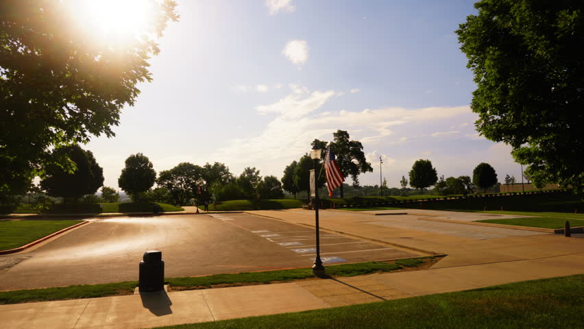 Memorial Hill in Kansas City is the only World War I Memorial in the country. This 1080p Time-lapse provides a view of the flag lined walkway to the memorial. The breeze keeps the flag active.