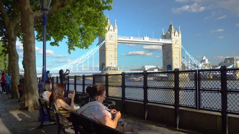 Tower Bridge - People Sitting At Pier - London, UK - June, 2018