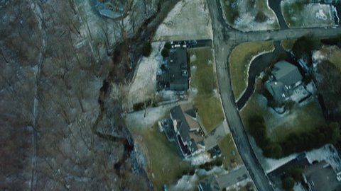 Top down aerial view of residential area in Bay Terrace, New York City. Wide shot. 4k shot with a RED camera.
