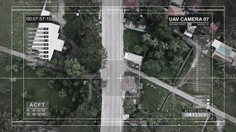 Drone with a camera monitors road in Asia. Top view of the cars and the highway.