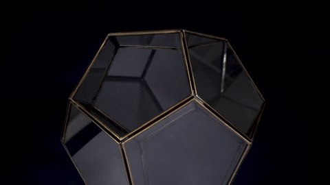 Стоковое видео: Glass and gold metal 3D abstract shape rotating on black background