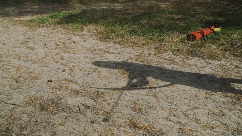 Shadow of archer on the ground