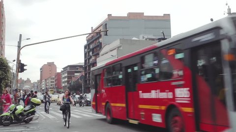 Bogotá, DC, Colombia - October 9th 2018: traffic police manage a busy intersection at rush hour in Chapinero suburb
