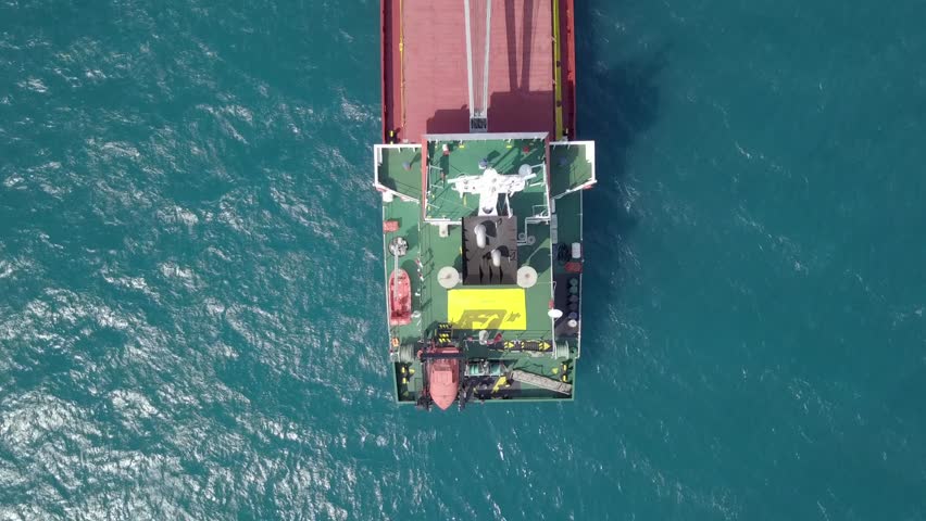 Large Bulk carrier vessel at the Mediterranean sea - Top down aerial footage