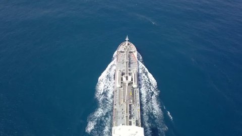 Mediterranean Sea - September 28, 2018: Large crude oil tanker roaring across The Mediterranean sea - Aerial footage following the ship