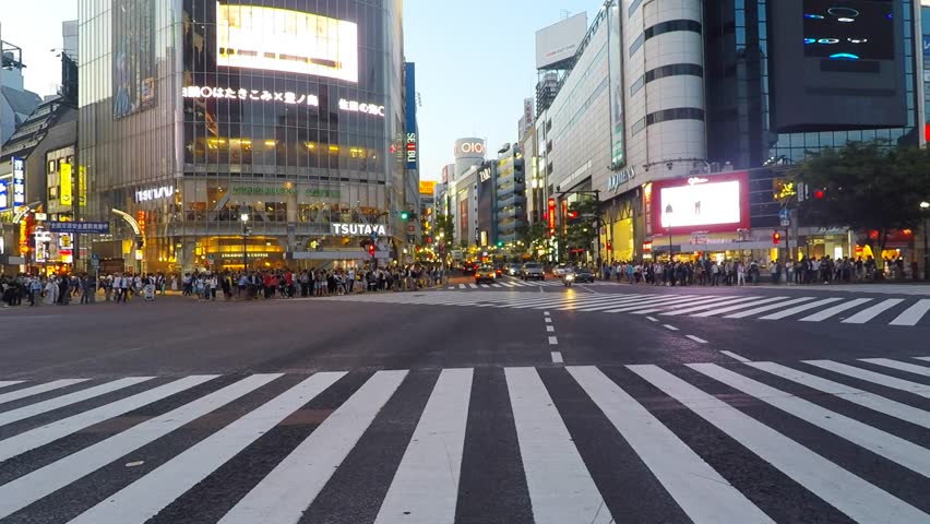 Tokyo, Japan - May 14, 2015: Time lapse of Pedestrians at Shibuya crossing, The famous scramble crosswalk also known as Shibuya scramble is used by over 2.5 million people on daily basis | Shutterstock HD Video #10181705
