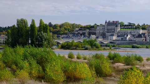 Amboise-France/Loire - October 10 2019 - Amboise - The Loire river and the village with the castle in background - Motion view 