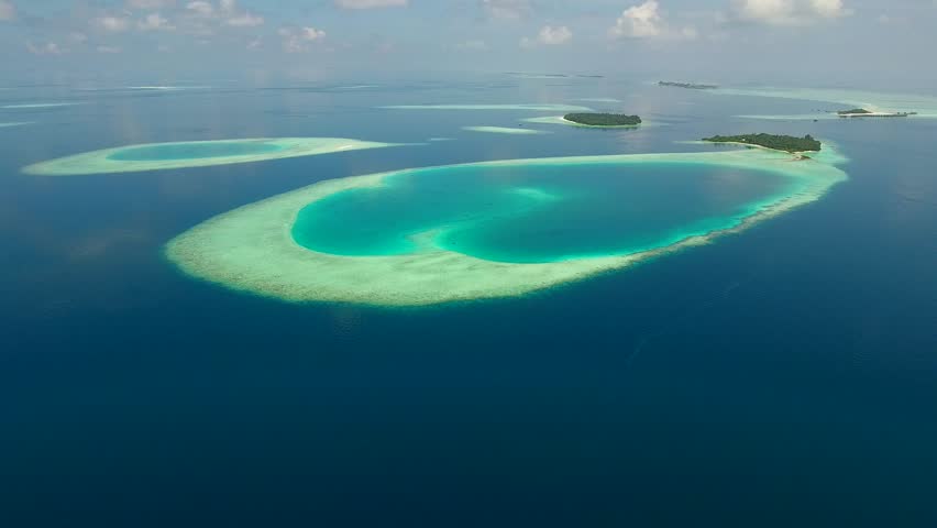 Aerial shot of Island Atoll in maldives