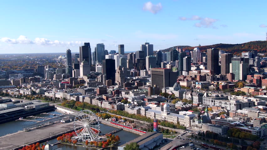 Aerial view of Downtown buildings and Old Port of Montreal in the Fall season in Montreal, Quebec, Canada.