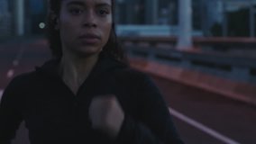 independent athlete woman running in city at night exercising female runner jogging training cardio workout enjoying fitness lifestyle - Powered by Shutterstock - Get 15% off with code: PIKWIZARD15