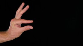 man showing something small between fingers