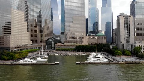 Aerial view of boats docked at the North Cove Marina (Hudson River) at Battery Park in Manhattan with Brookfield Place Complex and offices buildings on the background. New York, USA. 10/04/2018