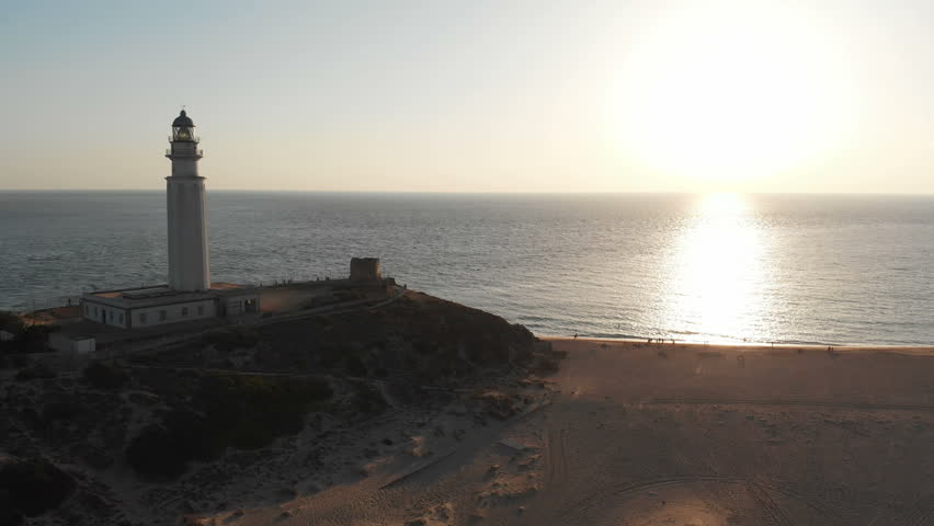 Lighthouse sunset, aerial shot, 4k