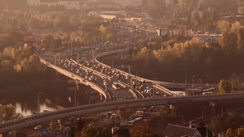 Beautiful aerial sunrise view footage of morning traffic during rush hour on Barrandov bridge in Prague, Czech republic.