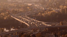Beautiful aerial sunrise view footage of morning traffic during rush hour on Barrandov bridge in Prague, Czech republic.