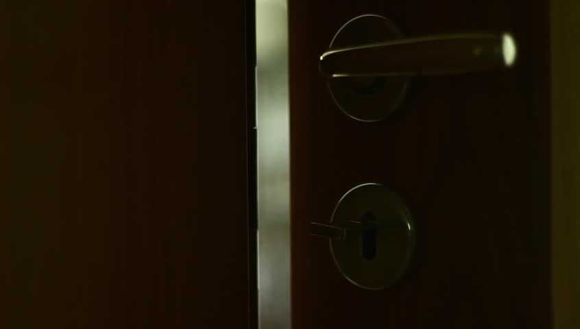 Wooden doors with locker, leading to a room in house. Out of focus. Royalty-Free Stock Footage #1018226908