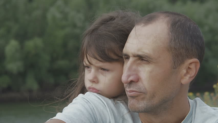 Sad family. Portrait of sad child with father.