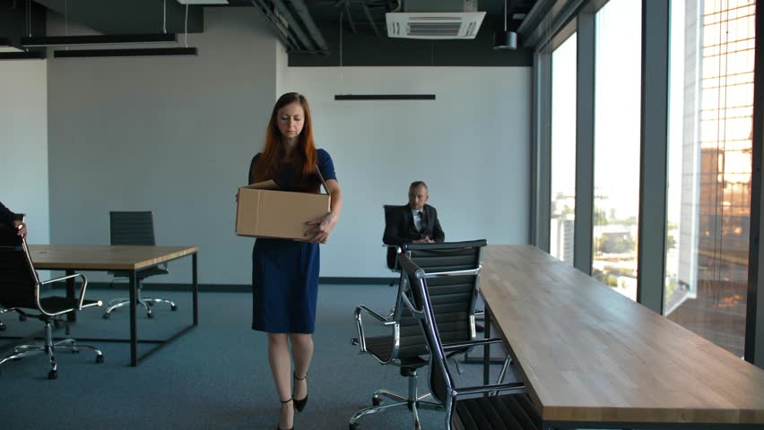 Redhair business woman in formal blue dress employee leave the office after being fired, employment and crisis concept. Sad colleagues understandingly look at the dismissed female. Wide shot. Royalty-Free Stock Footage #1018236832