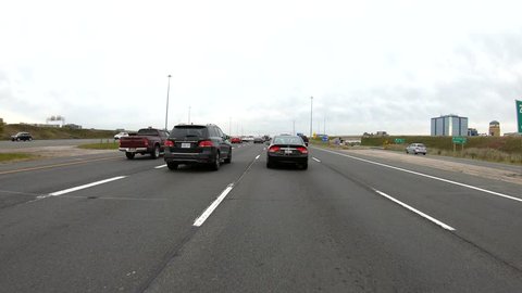Toronto, Ontario, Canada October 2018 Driving in traffic POV on highway in Toronto
