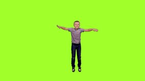 Little boy having fun on green chroma key background, Front view, 4k pre-keyed footage - Powered by Shutterstock - Get 15% off with code: PIKWIZARD15