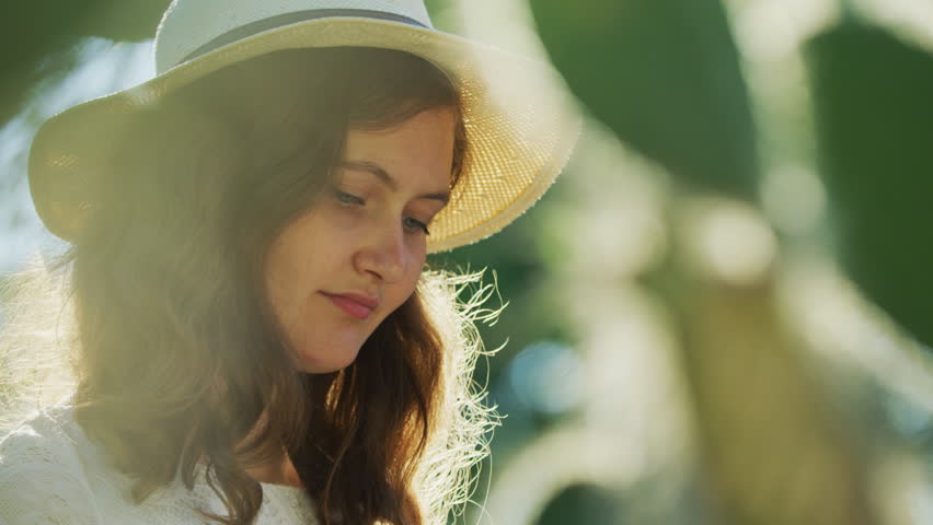 Girl with a summer hat.
