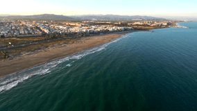 Aerial view of the beach in Puerto de Sagunto, Valencia. Spain. 4k Drone Video