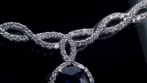 Slow Motion Macro Shine of diamond necklace with blue sapphire