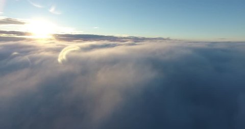 4K Drone aerial Sky over the clouds, sun