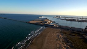 Aerial view of the beach in Puerto de Sagunto, Valencia. Spain. 4k Drone Video