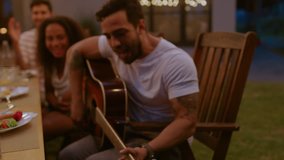 Big Family Garden Party Celebration, Gathered Together at the Table Relatives and Friends, Young and Elderly are Eating, Drinking, Passing Dishes, Joking and Having Fun.  - Powered by Shutterstock - Get 15% off with code: PIKWIZARD15