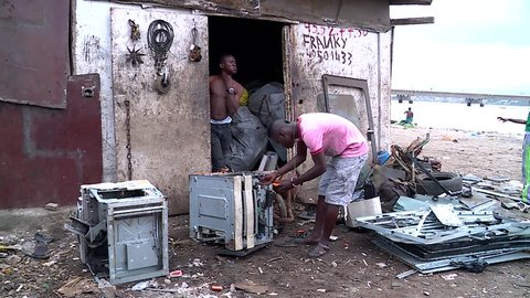 Abidjan, Cote d'Ivoire - 09 19 2016: ABIDJAN, IVORY COAST, September 2016. Electronic waste dangerously recycled in Abidjan, Africa.
