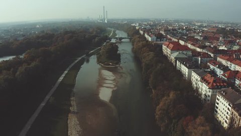 Modern cityscape in Munich, European City .  River Isar running through the middle of the town in late summer mood