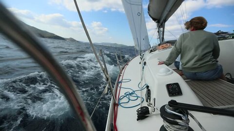 ERMIONI - POROS, GREECE - OCT 9, 2018: Sailboats participate in sailing regatta 20th Ellada Autumn 2018 among Greek island group in the Aegean Sea, in Cyclades and Saronic Gulf.
