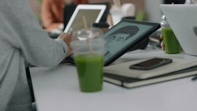 group of engineers developing facial recognition software technology using digital tablet computer brainstorming design solution sharing project ideas in busy office meeting - Powered by Shutterstock - Get 15% off with code: PIKWIZARD15