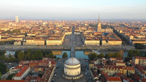 Turin skyline aerial view fly over city centre view of bridge and most pupular square in torino city italy.
