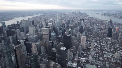 New York City Circa-2015, wide angle aerial view of Manhattan, Brooklyn and Jersey City, flying over Midtown Manhattan from Hell's Kitchen