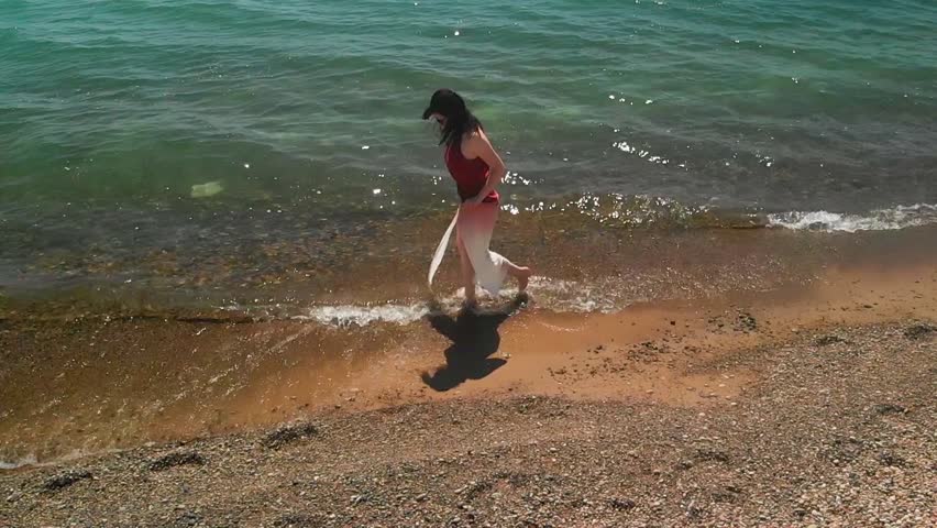 Woman walking on the beach Lake Michigan Illinois