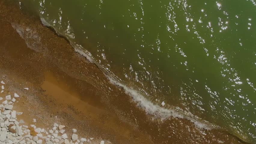 man walking on the beach Lake Michigan Illinois