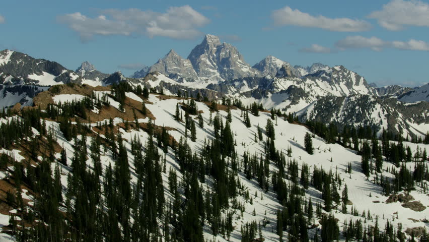 Aerial view of Mt Moran in the Grand Teton mountain Range a wilderness area visited by tourists Yellowstone National Park Wyoming USA RED WEAPON
