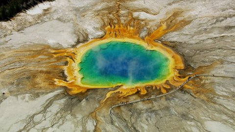 Aerial view of Yellowstone Midway geyser Basin hot mineral rich water vivid colors Yellowstone National Park Grand Prismatic Spring Wyoming USA RED WEAPON