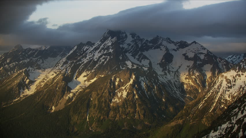 Aerial view at sunrise of the majestic Yellowstone National Park Wyoming Teton wilderness mountain Range part of the Rocky mountains Northern USA RED WEAPON